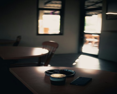 A cup of coffee on a table during a relaxing afternoon break